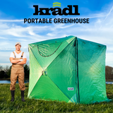 man standing in front of portable greenhouse tent